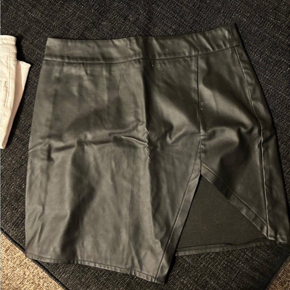 Black leather skirt with slit